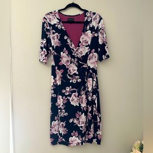 Floral wrap style dress. Mid length, 3/4 sleeves, v neck